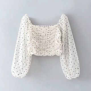 Blusa lunares