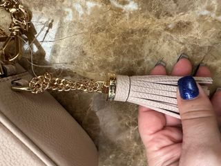 Bolso bandolera con borla MK