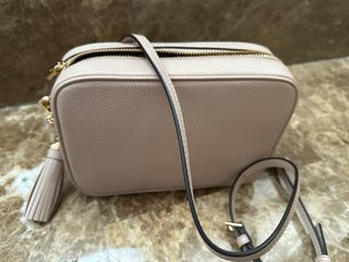 Bolso bandolera con borla MK