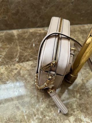 Bolso bandolera con borla MK