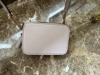 Bolso bandolera con borla MK