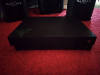 X box one x + juegos