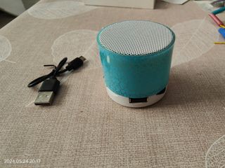 Mini altavoz portátil
