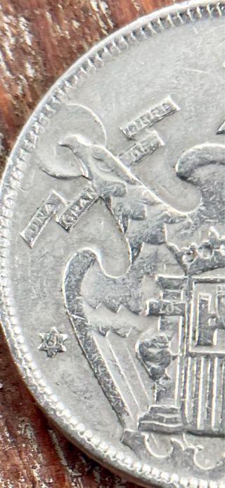 Moneda de 25 pesetas de franco 1957, estrella 61.