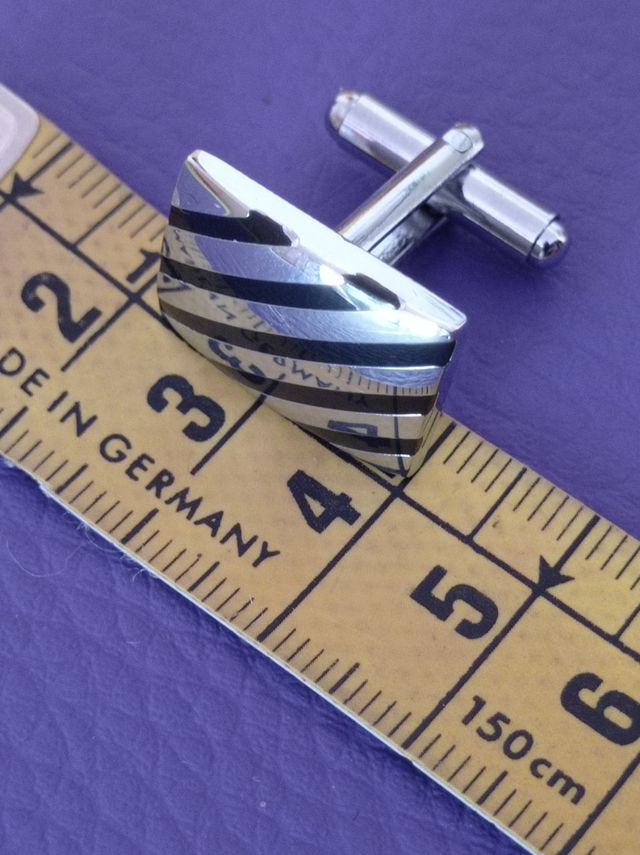 Gemelos plateados de acero. NUEVOS.