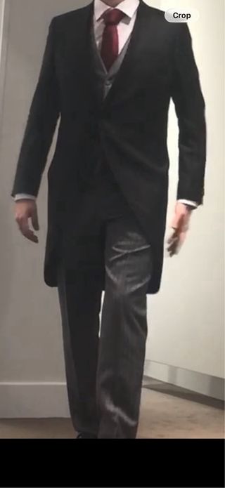 Traje chaqué negro y gris hombre.