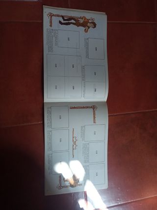 Álbum de cromos taron y el caldero magic