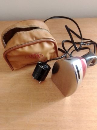 Bonita plancha de viaje vintage.Perfecto estado