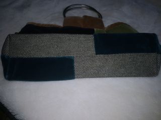 Bolso de mano multicolor marca whyana.