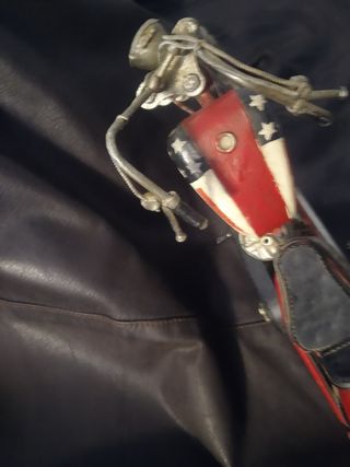 MOTO A ESCALA