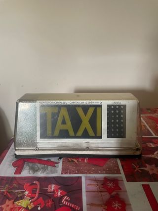 Taxímetro y capilla Taxi