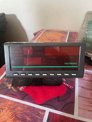 Taxímetro y capilla Taxi