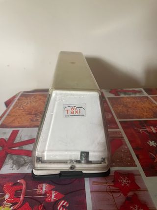 Taxímetro y capilla Taxi
