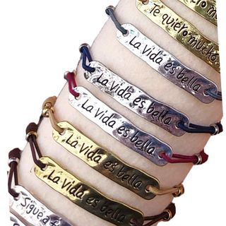 Lote 40 pulseras con chapa metálica grabada y goma