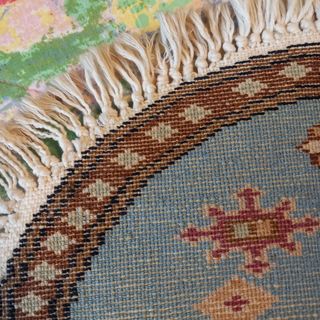 Tappetino persiano tondo