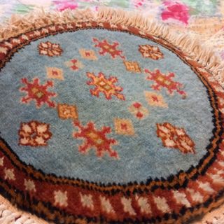 Tappetino persiano tondo