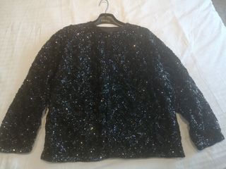 Chaqueta de fiesta de lentejuelas en negro