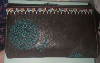 Bolso y cartera mariposa rosa tigre Desigual