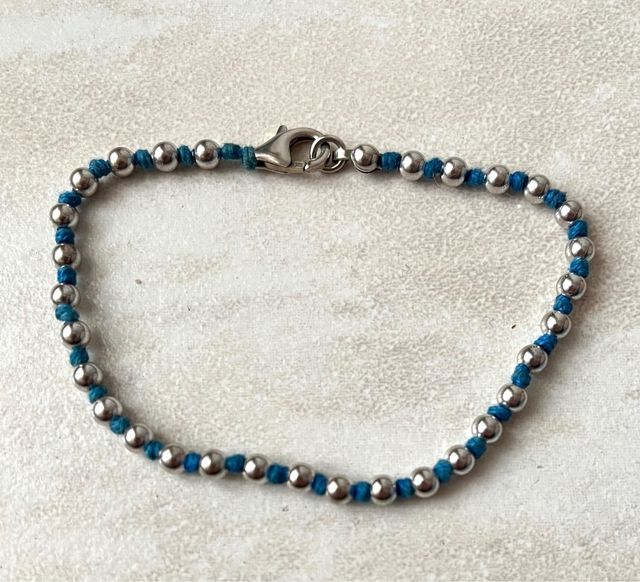 Bracciale argento 925 rodiato a nodi