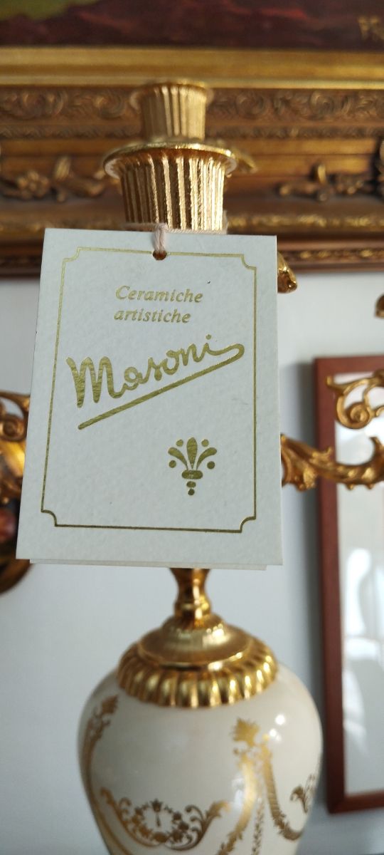 Coppa con candelabri