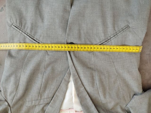 Americana gris en buen estado