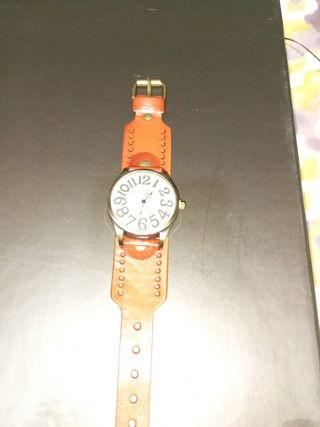 Reloj de pulsera.
