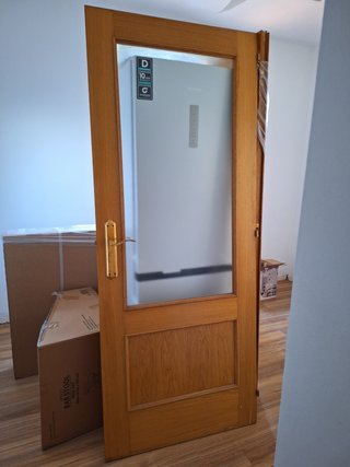 Doble puerta de madera y cristal