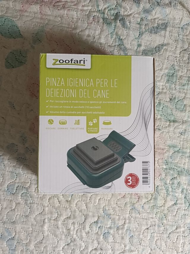 Pinzas recoge excremento