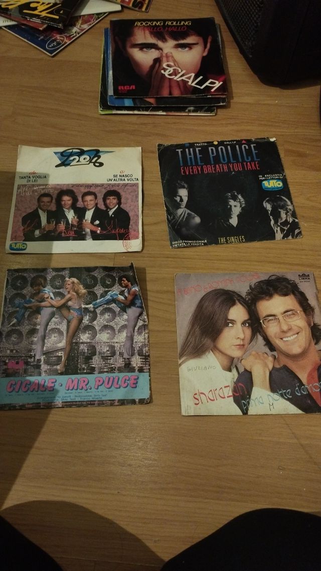 Lotto 4 vinili Pooh the Police Albano e 