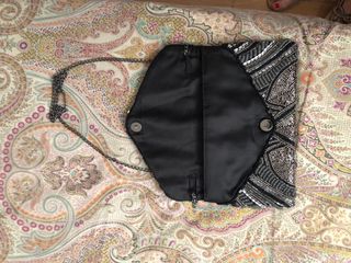 Bolso de fiesta sfera con lentejuelas. 