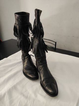 Texani Stivali di pelle con frange.