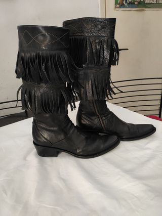 Texani Stivali di pelle con frange.