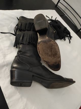 Texani Stivali di pelle con frange.