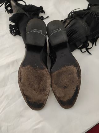 Texani Stivali di pelle con frange.