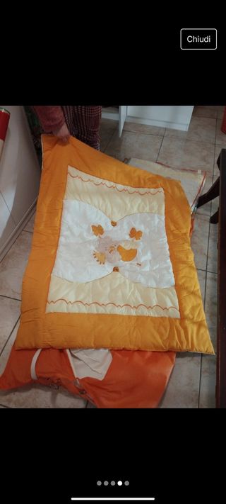 Paracolpi e piumone per culla
