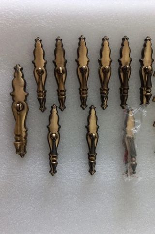 Lote de tiradores latonados