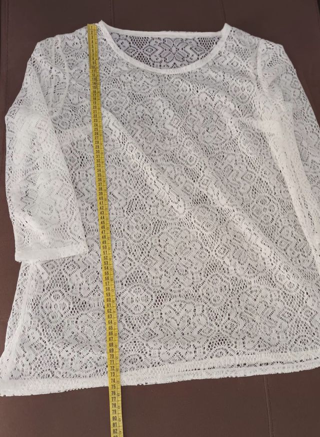 Blusa de encaje calado