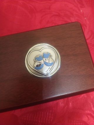 Piccola cornice in argento e cofanetto.