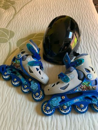 Patines talla 30 ,31, 32,33 y casco 