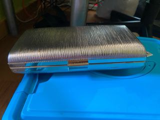 Cartera de mano dorada