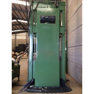 Prensa para empaquetar ropa usada