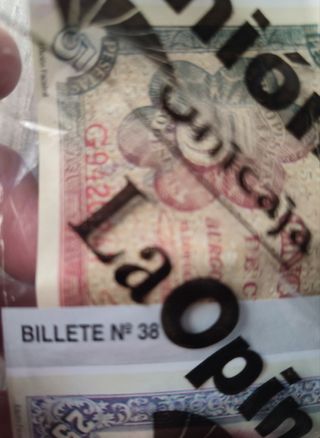 Billetes de 5 y 25 pesetas más moneda