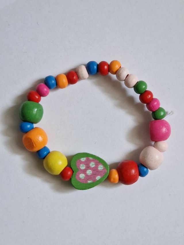 set collana con ciondolo e 2 bracciali