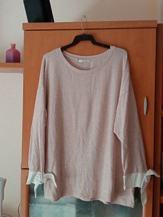 Blusa rosa manga larga con nudo