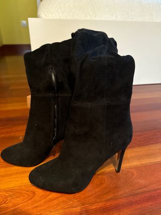 Botas altas encima rodilla