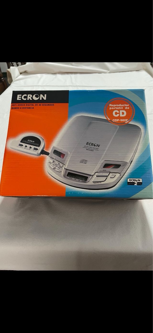 Reproductor portatil CD con mando a distancia