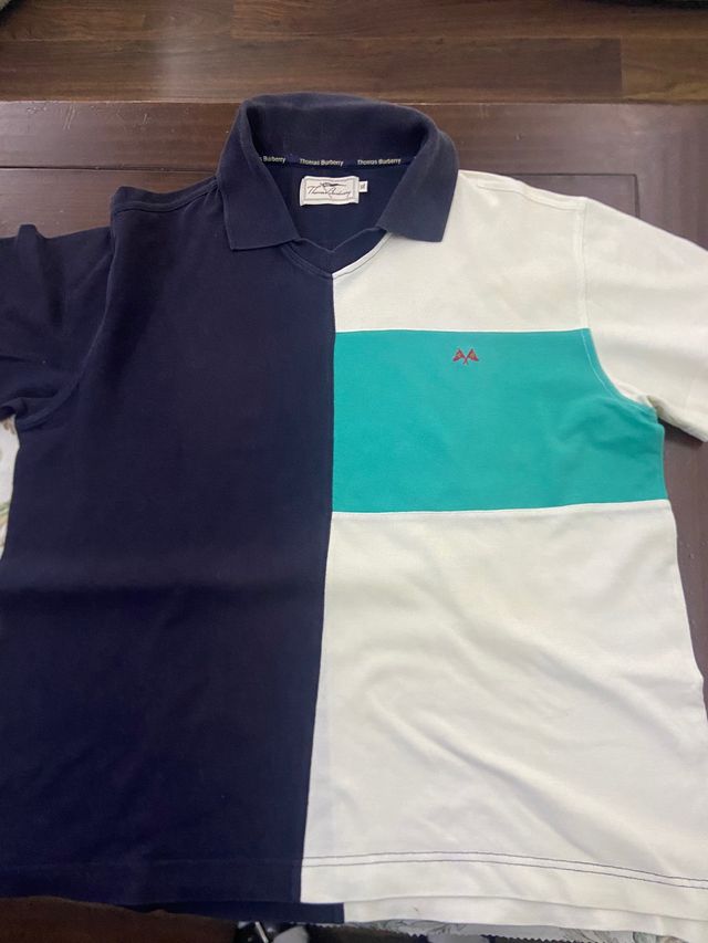 Polo thomas  burberry talla XL .10€