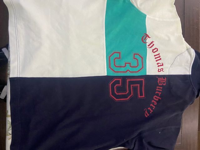 Polo thomas  burberry talla XL .10€