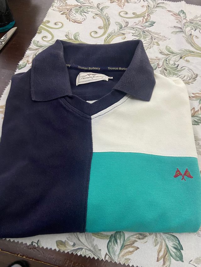 Polo thomas  burberry talla XL .10€