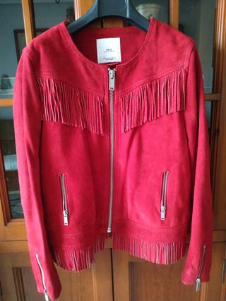 Vendo chaqueta unisex ,talla 14-16 